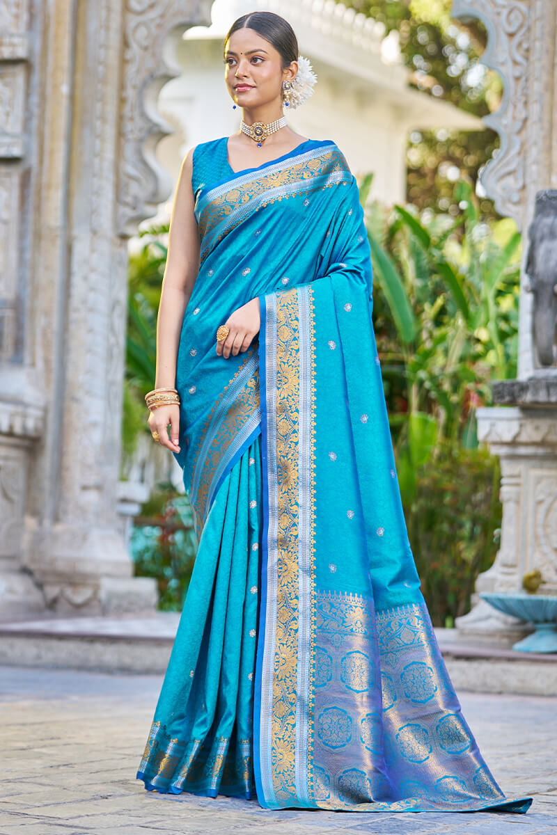 Desiring Firozi Kanjivaram Silk Saree With Serendipity Blouse Piece