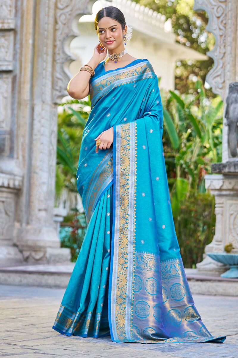 Desiring Firozi Kanjivaram Silk Saree With Serendipity Blouse Piece