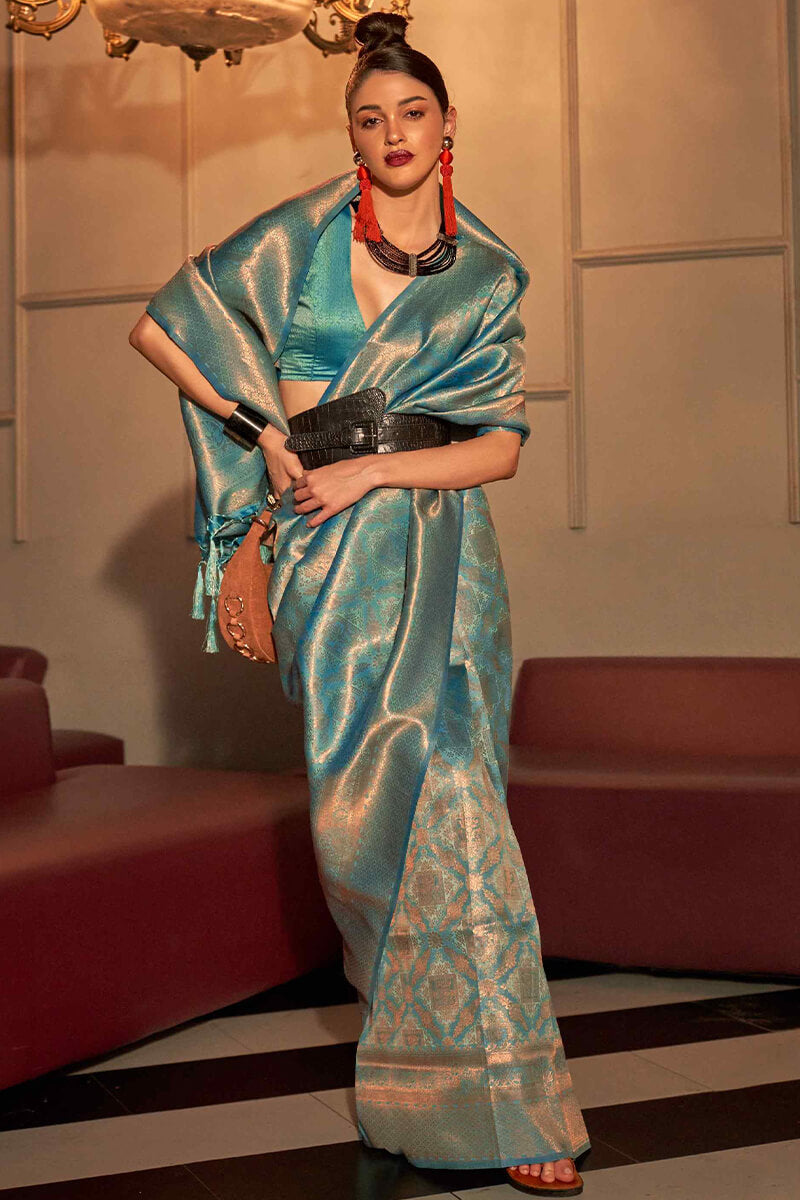 Bewitching Turquoise Kanjivaram Silk Saree With Enigmatic Blouse Piece