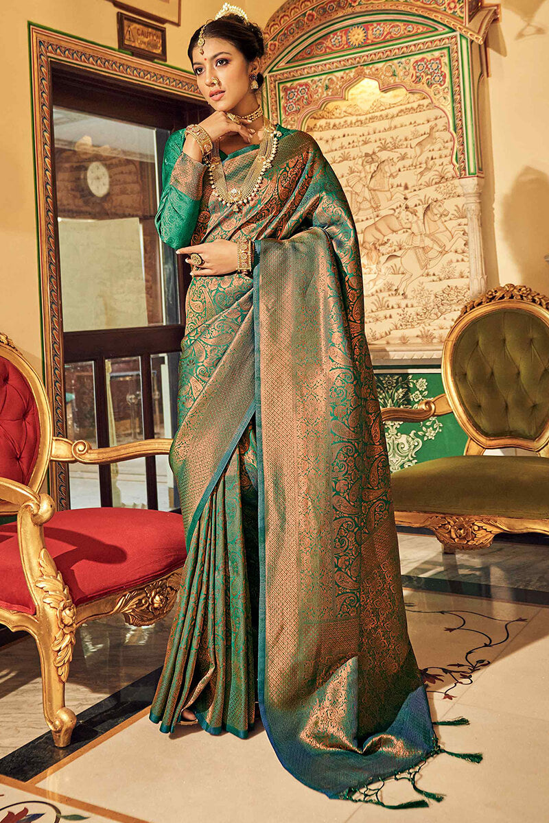 Engaging Dark Green Kanjivaram Silk Saree With Dissemble Blouse Piece