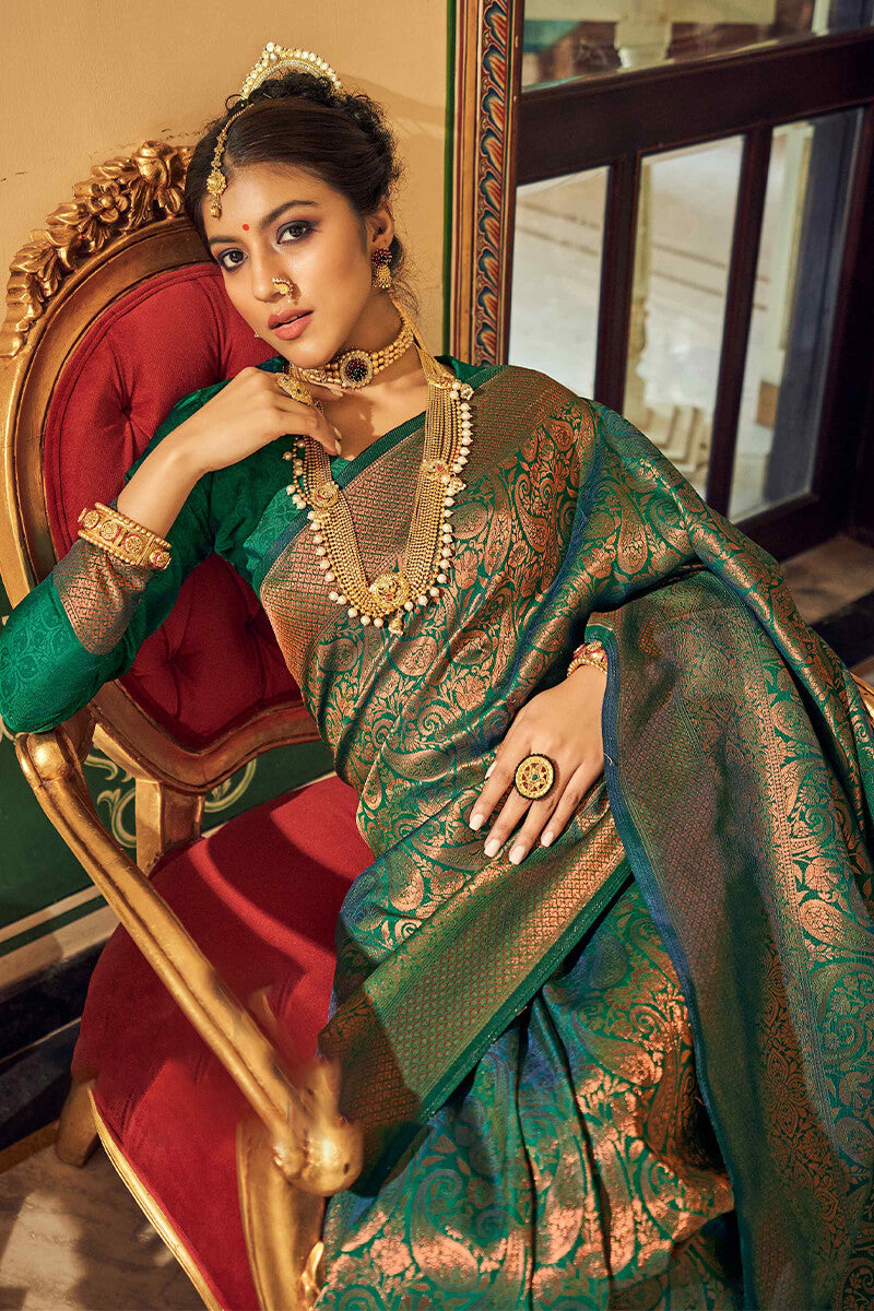 Engaging Dark Green Kanjivaram Silk Saree With Dissemble Blouse Piece