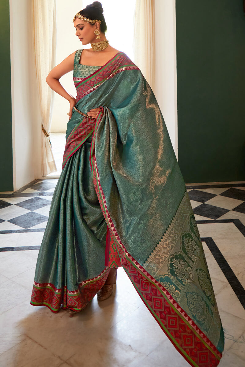 A glam Rama Kanjivaram Silk Saree With Improbable Blouse Piece