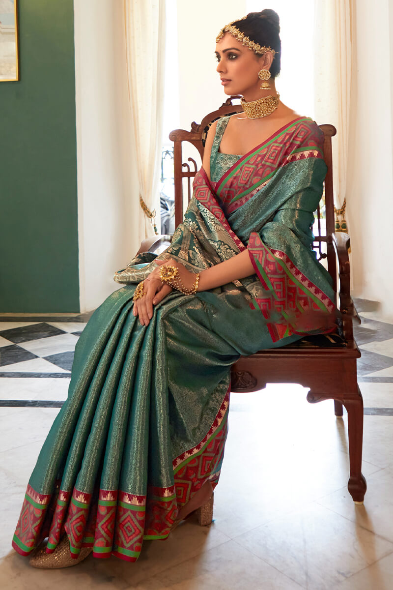 A glam Rama Kanjivaram Silk Saree With Improbable Blouse Piece