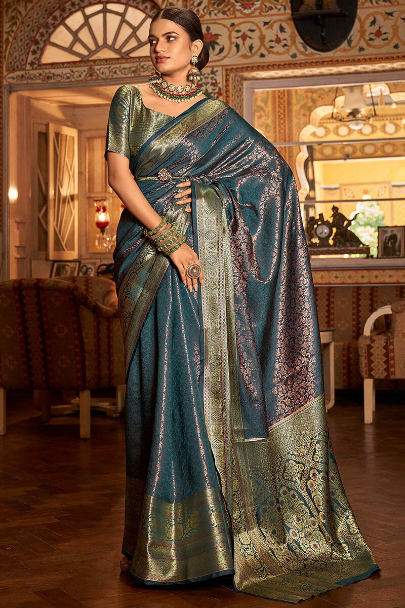 Stunner Rama Kanjivaram Silk Saree With Profuse Blouse Piece