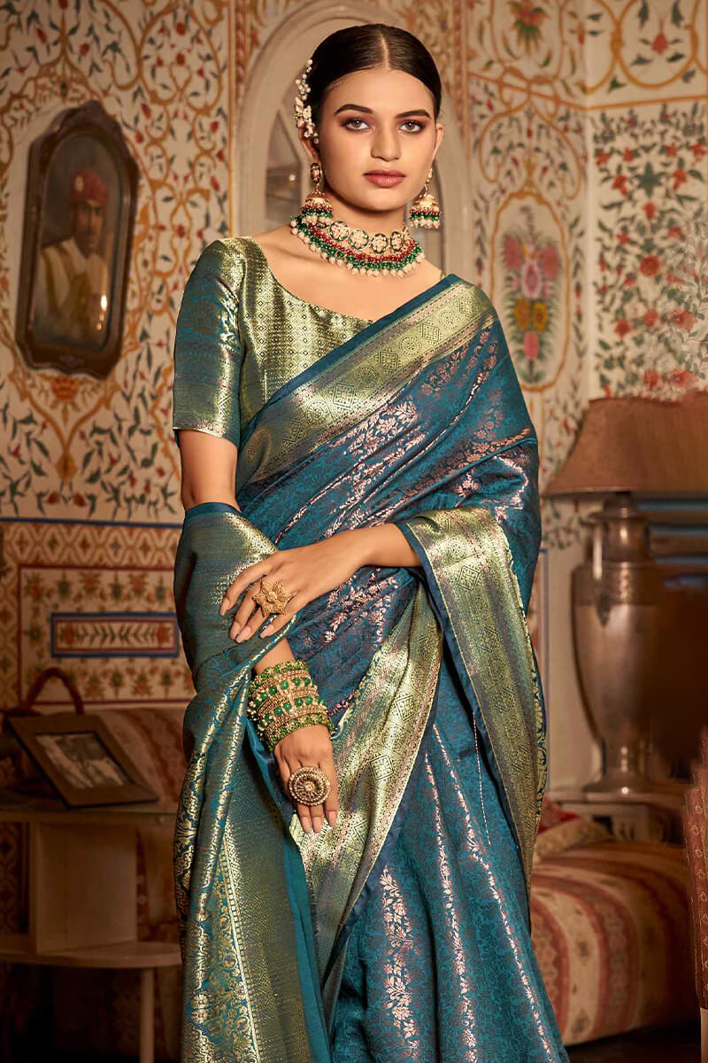 Stunner Rama Kanjivaram Silk Saree With Profuse Blouse Piece