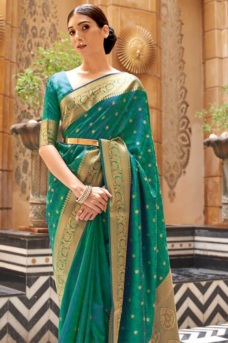 Prominent Rama Kanjivaram Silk Saree With Splendiferous Blouse Piece