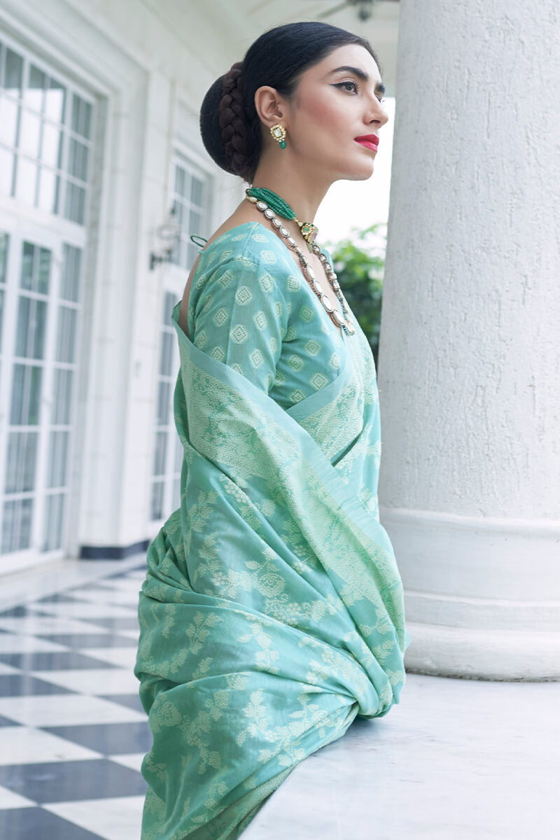 Eloquence Turquoise Lucknowi Silk Saree and Zephyr Blouse Piece