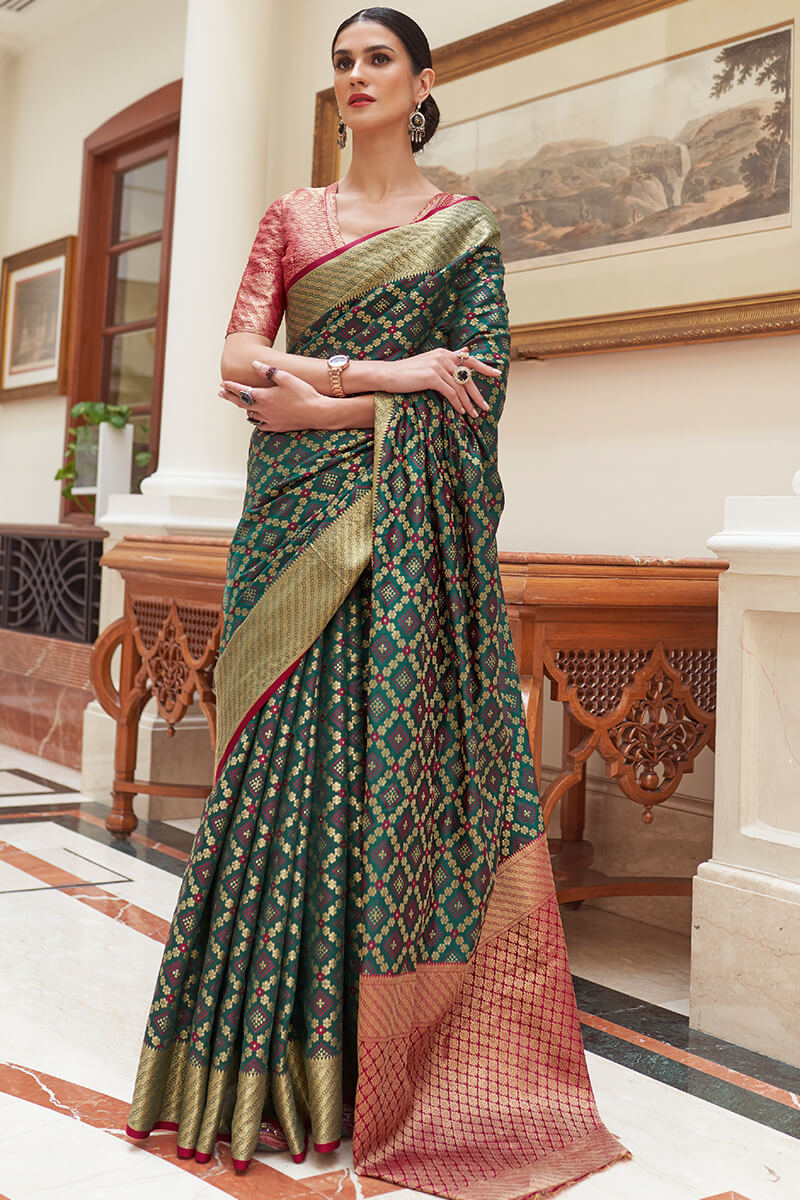 Fantabulous Dark Green Soft Patola Silk Saree with Pleasant Blouse Piece