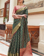 Fantabulous Dark Green Soft Patola Silk Saree with Pleasant Blouse Piece