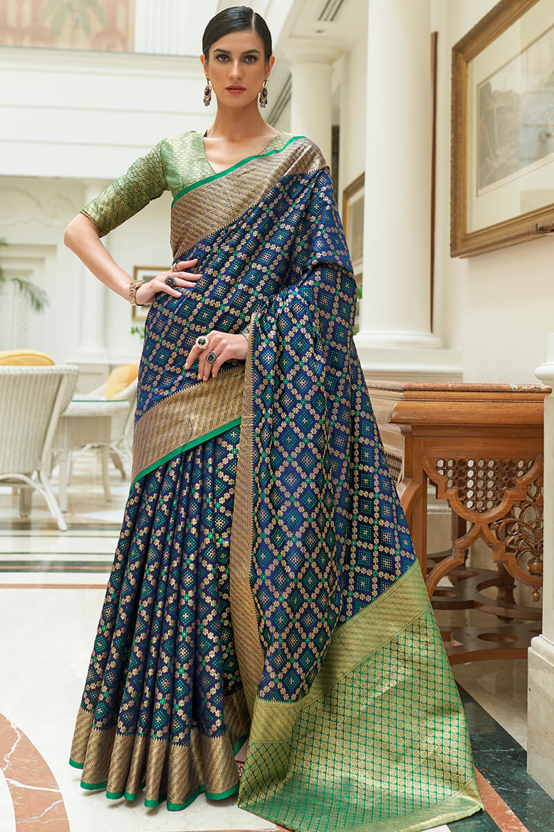 Enchanting Navy Blue Soft Patola Silk Saree with Flamboyant Blouse Piece