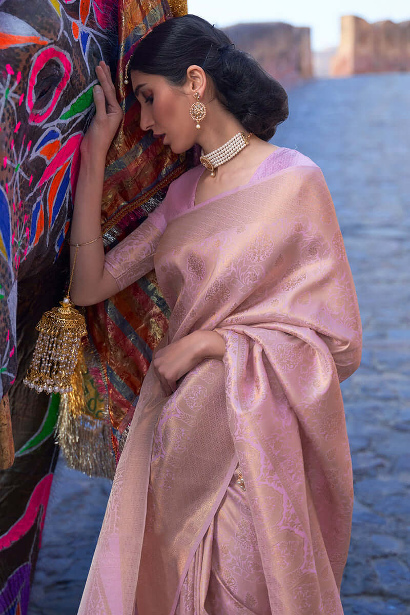 Lissome Baby Pink Kanjivaram Silk Saree with Exquisite Blouse Piece