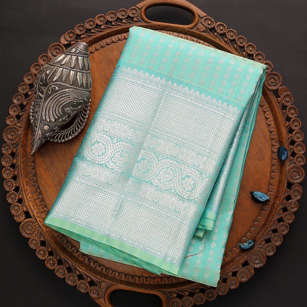 Engrossing Firozi Soft Silk Saree With Incomparable Blouse Piece