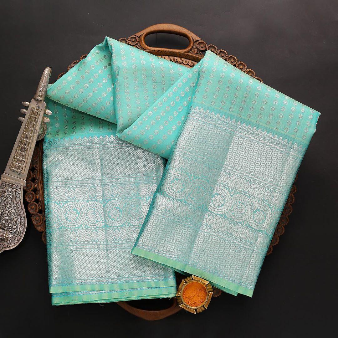 Engrossing Firozi Soft Silk Saree With Incomparable Blouse Piece