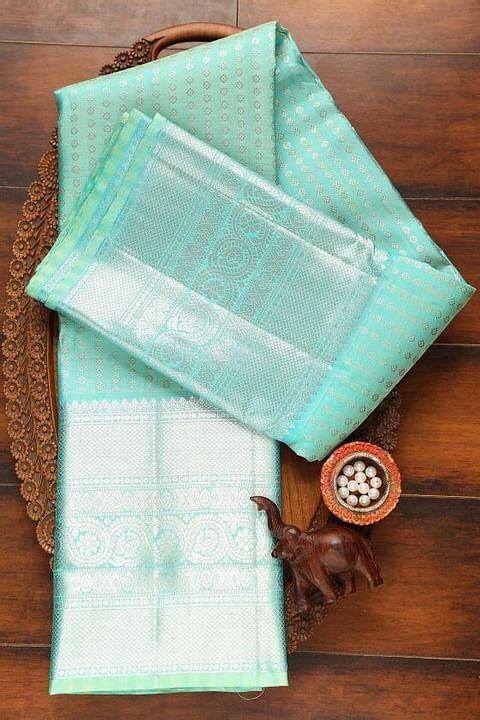 Engrossing Firozi Soft Silk Saree With Incomparable Blouse Piece