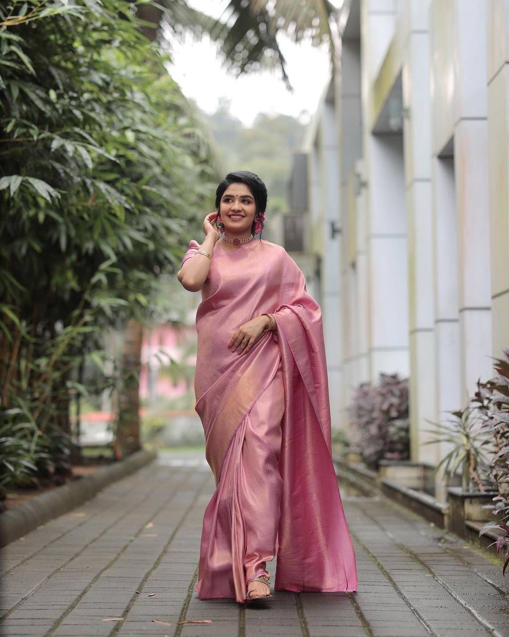 Embrocation Pink Soft Silk Saree With Snazzy Blouse Piece