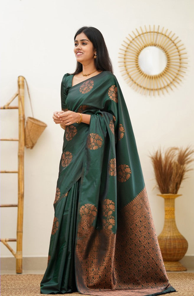 A dreamy Dark Green Soft Silk Saree With Adorable Blouse Piece