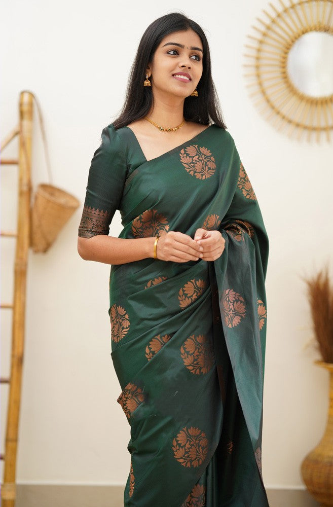 A dreamy Dark Green Soft Silk Saree With Adorable Blouse Piece