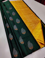 Dazzling Dark Green Soft Silk Saree With Cynosure Blouse Piece