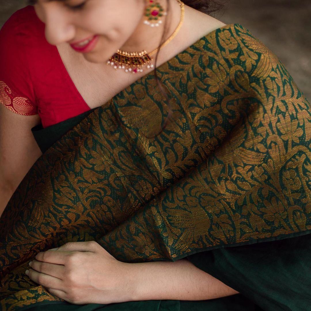 Sensational Green Soft Silk Saree With Evocative Blouse Piece