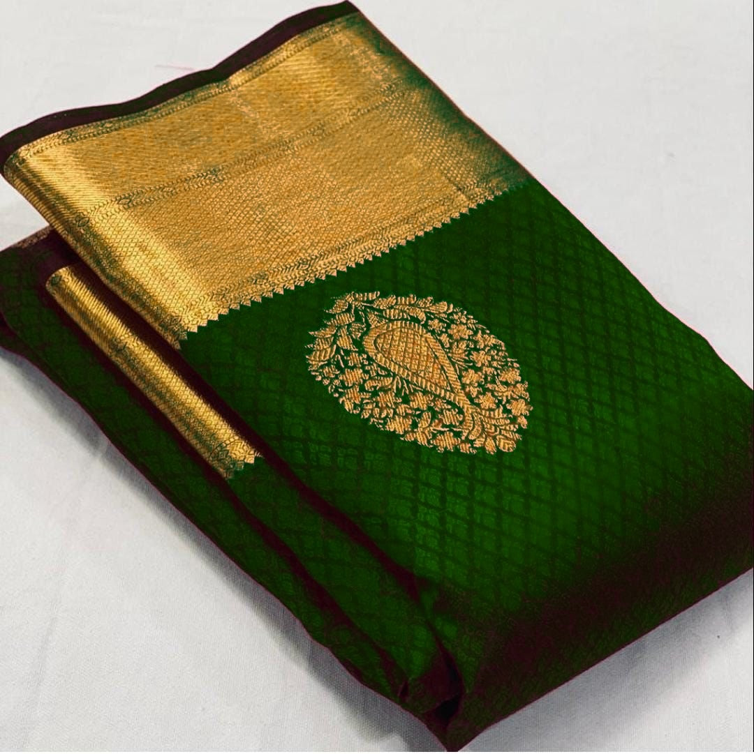 Elaborate Dark Green Soft Silk Saree With Nectarous Blouse Piece