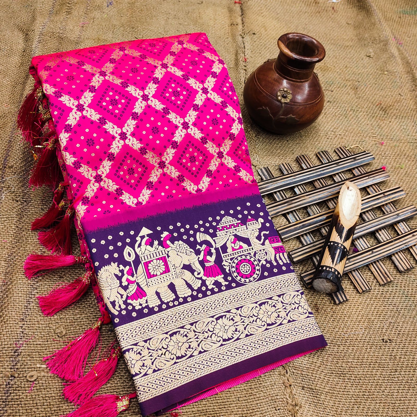 Fancifull Dark Pink Patola Silk Saree with Quixotic Blouse Piece