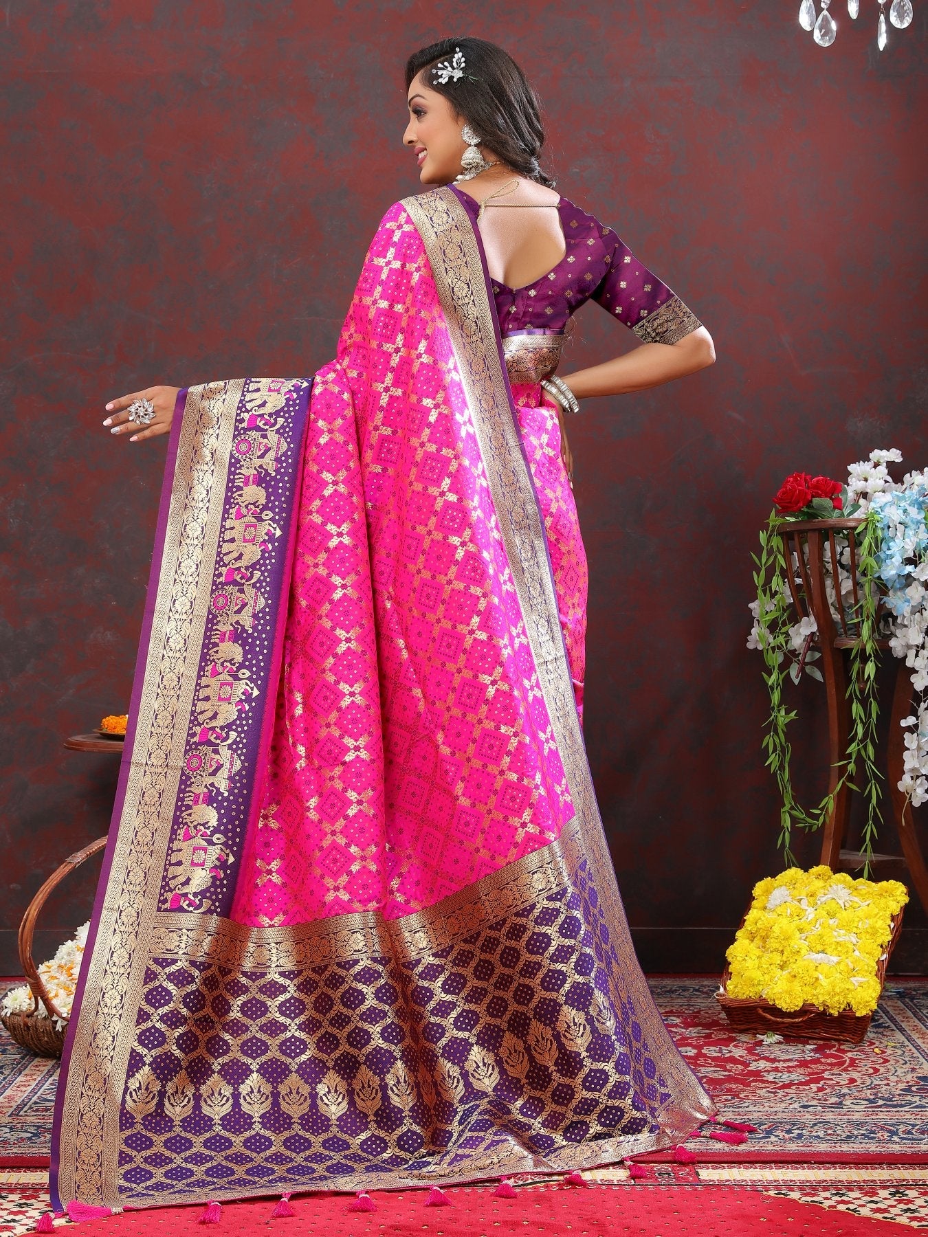 Fancifull Dark Pink Patola Silk Saree with Quixotic Blouse Piece