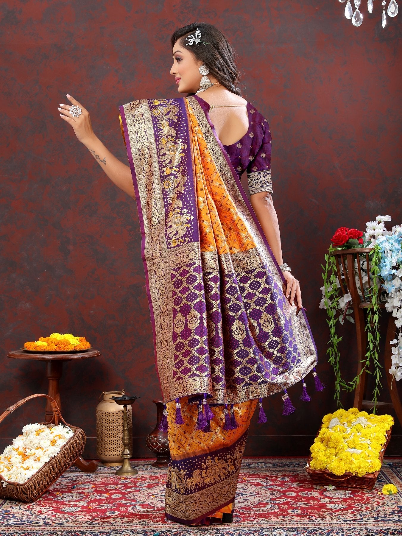 Elision Orange Patola Silk Saree with Effulgent Blouse Piece