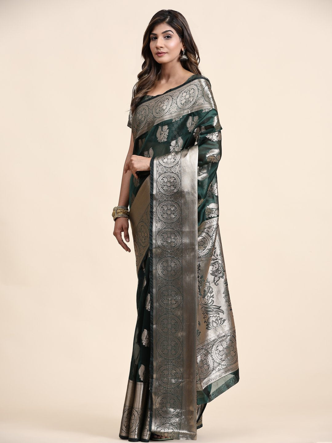 Exceptional Dark Green Organza Silk Saree With Whimsical Blouse Piece