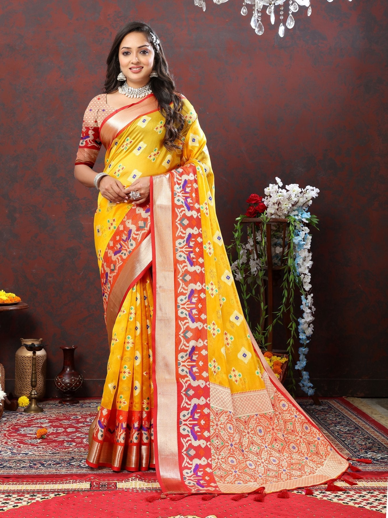 A glam Yellow Organza Silk Saree With Profuse Blouse Piece