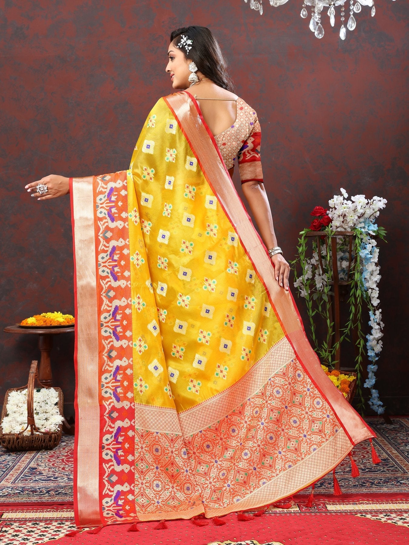 A glam Yellow Organza Silk Saree With Profuse Blouse Piece