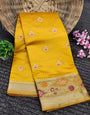 Staring Yellow Soft Banarasi Silk Saree With Tempting Blouse Piece