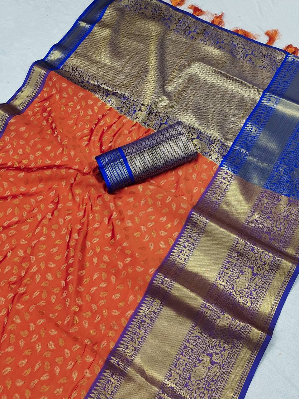 Artistic Orange Banarasi Silk Saree With Prominent Blouse Piece