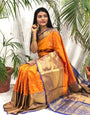 Artistic Orange Banarasi Silk Saree With Prominent Blouse Piece