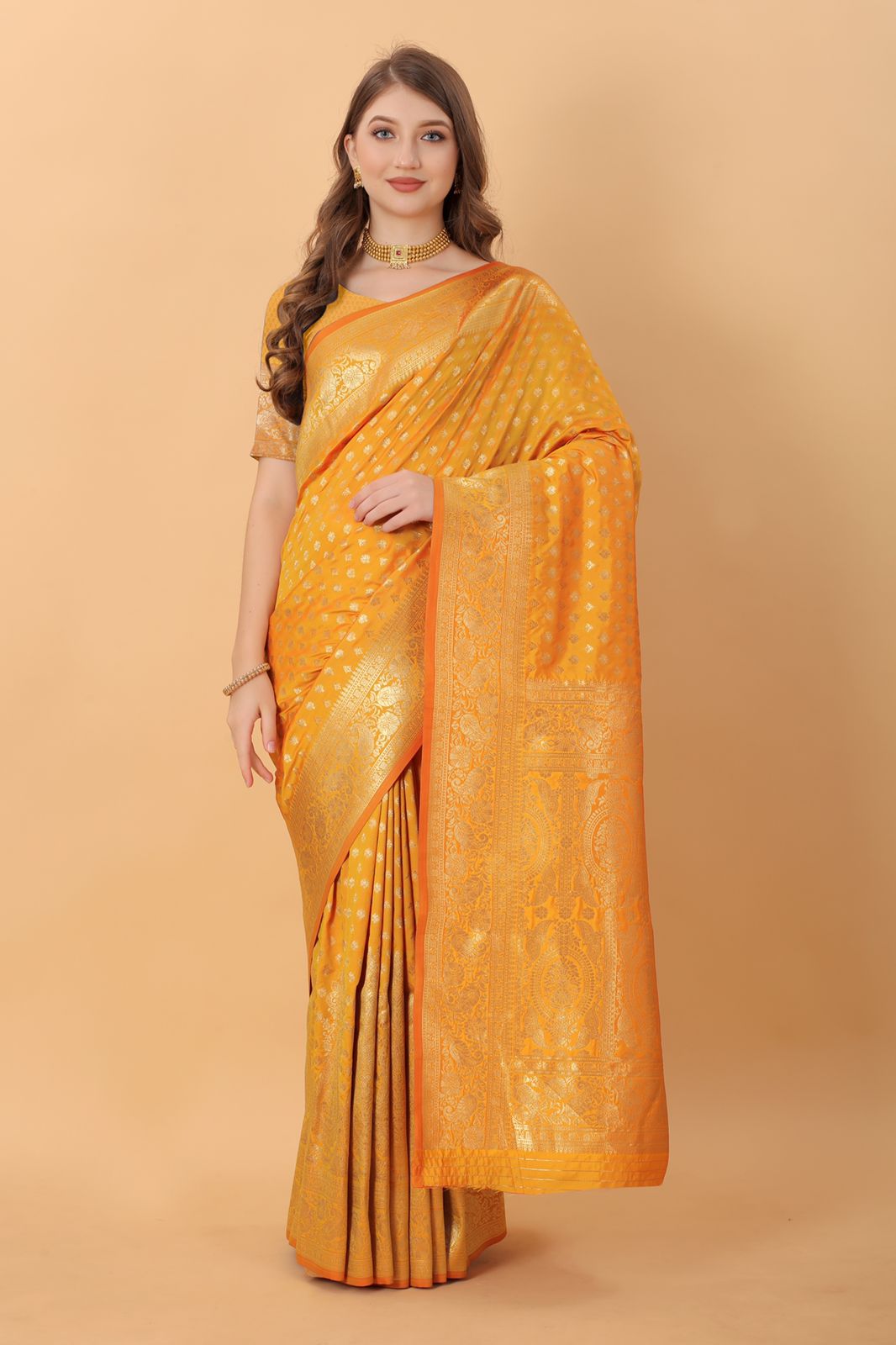 Cynosure Stunning Yellow Banarasi Silk Saree With Divine Blouse Piece