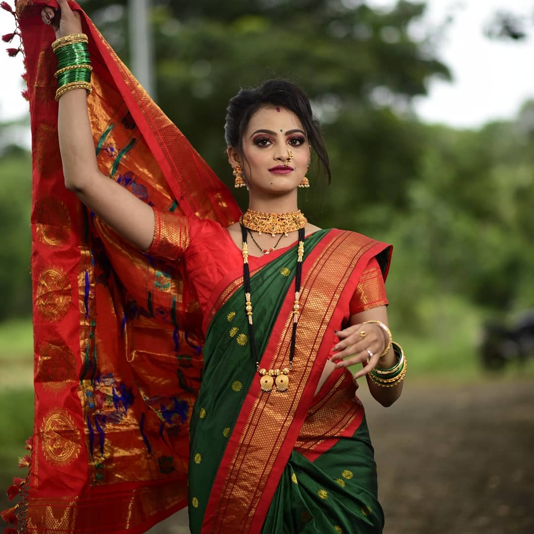 Captivating Green Paithani Silk Saree With Resplendent Blouse Piece