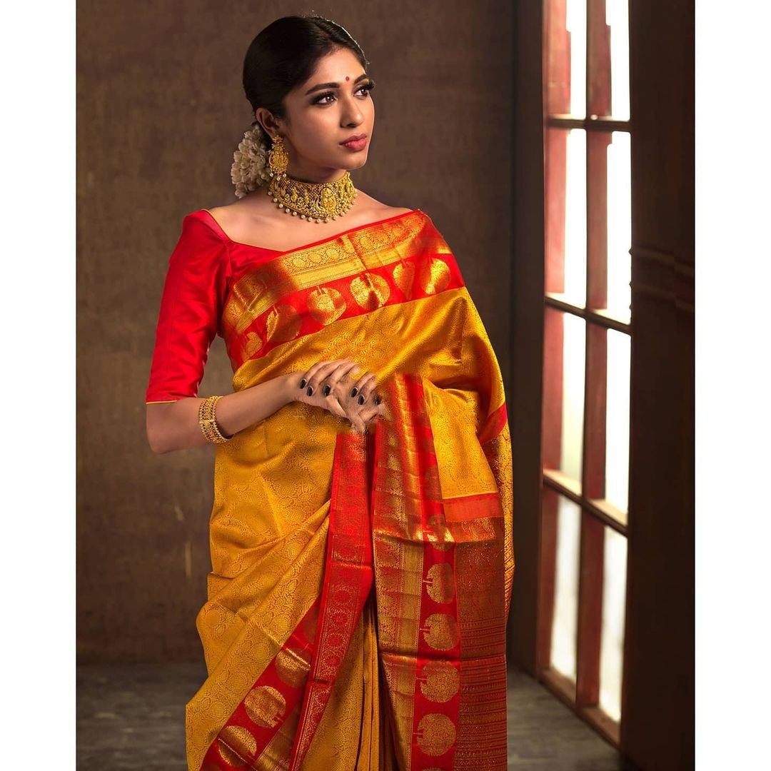 Charming Yellow Soft Silk Saree With Ideal Blouse Piece