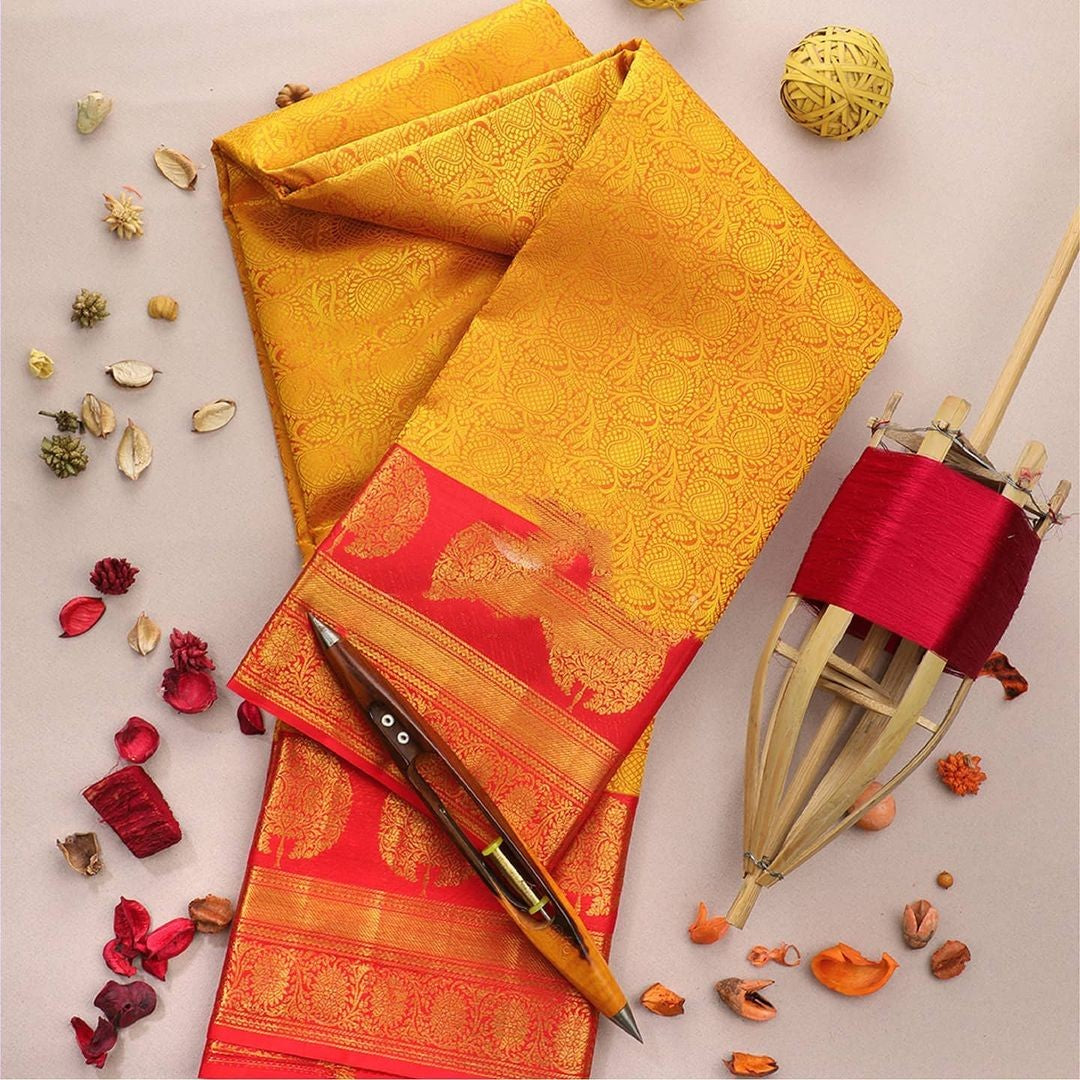 Charming Yellow Soft Silk Saree With Ideal Blouse Piece