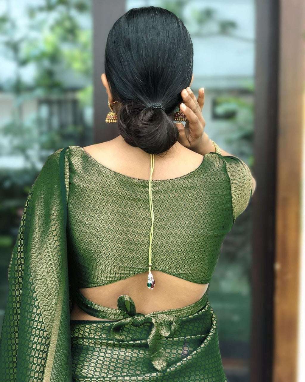 Elaborate Green Soft Silk Saree With Elaborate Blouse Piece