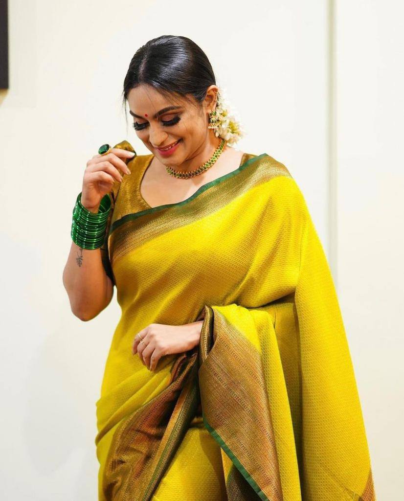 Gorgeous Yellow Soft Silk Saree With Gratifying Blouse Piece