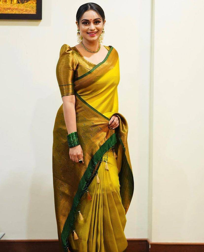 Gorgeous Yellow Soft Silk Saree With Gratifying Blouse Piece