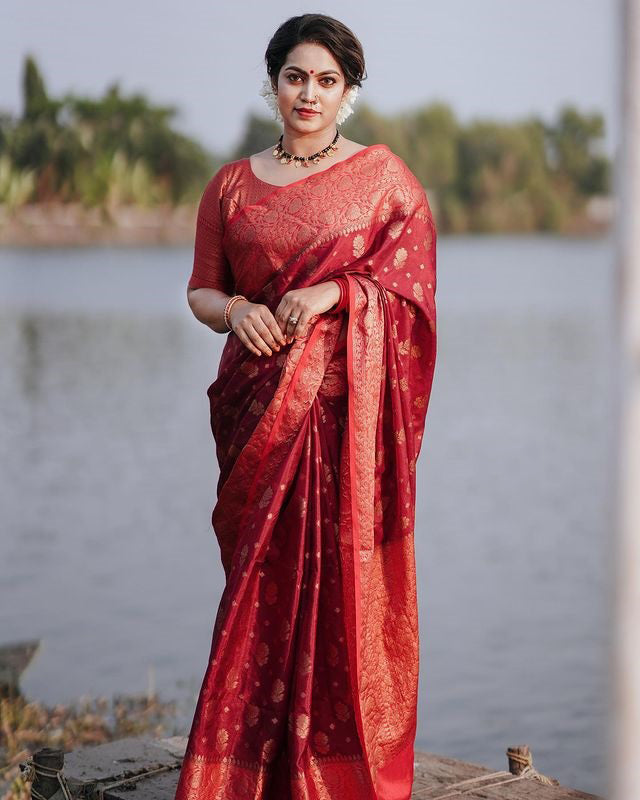 Delightful Red Soft Silk Saree With Cynosure Blouse Piece