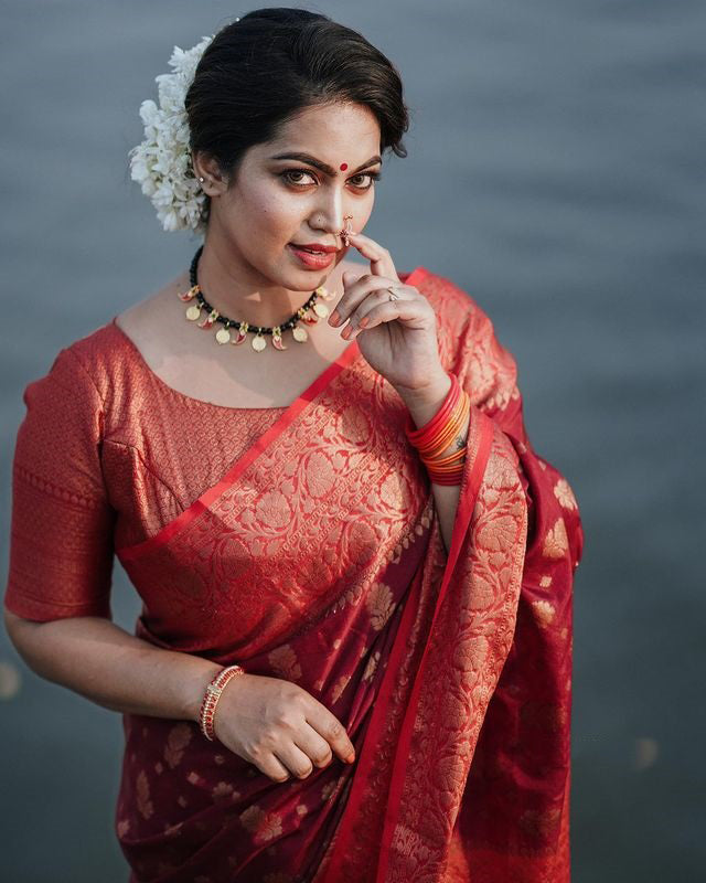 Delightful Red Soft Silk Saree With Cynosure Blouse Piece