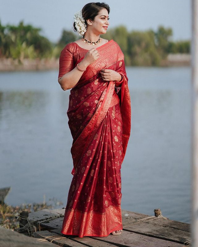 Delightful Red Soft Silk Saree With Cynosure Blouse Piece