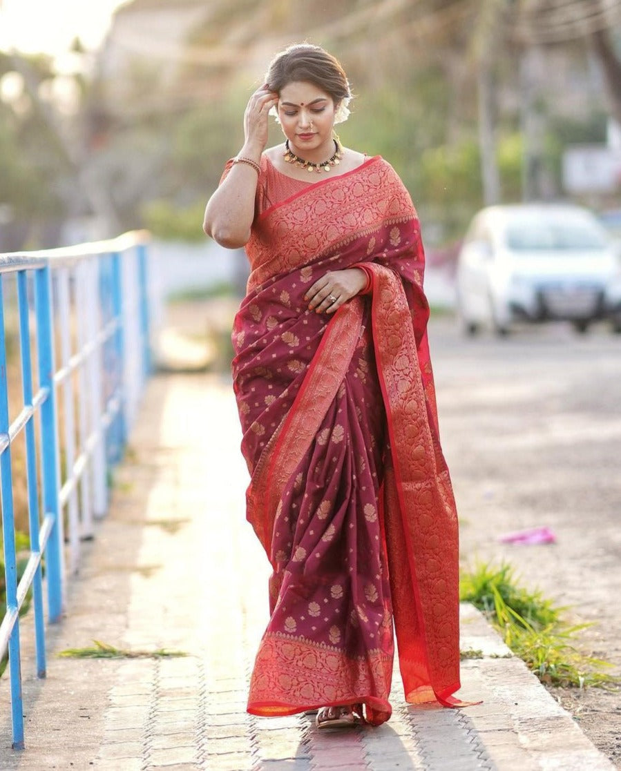 Delightful Red Soft Silk Saree With Cynosure Blouse Piece