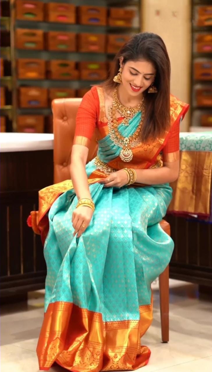 Twirling Turquoise Soft Silk Saree with Redolent Blouse Piece