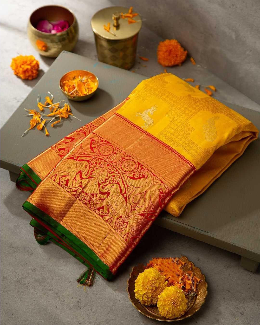 Flattering Yellow Soft Silk Saree With Adoring Blouse Piece