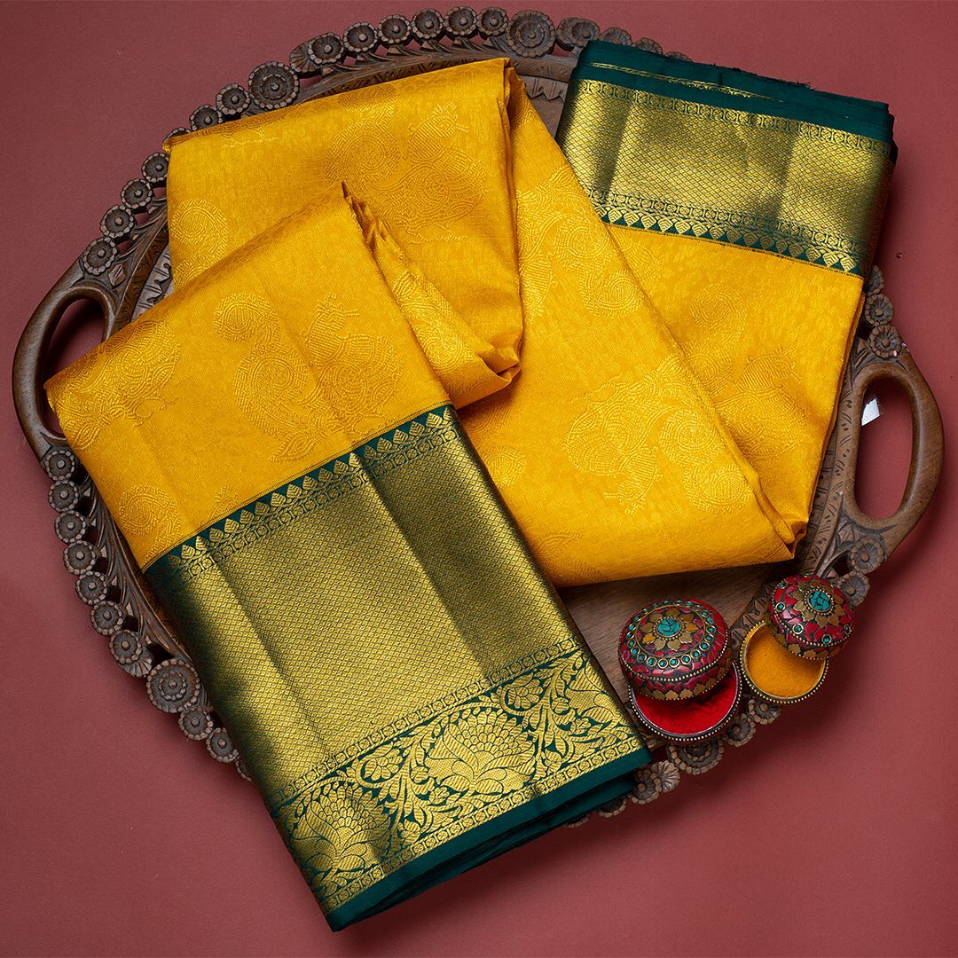 Flaunt Yellow Soft Silk Saree With Lovely Two Blouse Piece