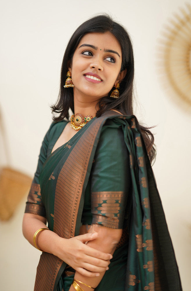 Supernal Dark Green Soft Silk Saree With Mesmeric Blouse Piece