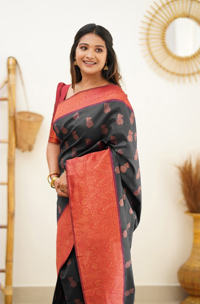 Hypnotic Black Soft Silk Saree With Snazzy Blouse Piece