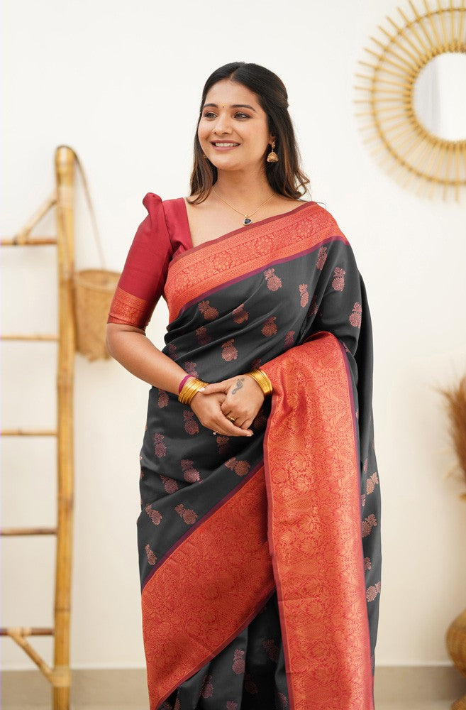 Hypnotic Black Soft Silk Saree With Snazzy Blouse Piece